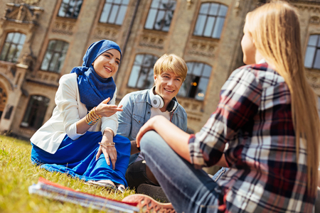 Classy pretty woman telling interesting storiesの写真素材