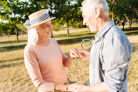 Romantic female person being in straw bonnetの写真素材