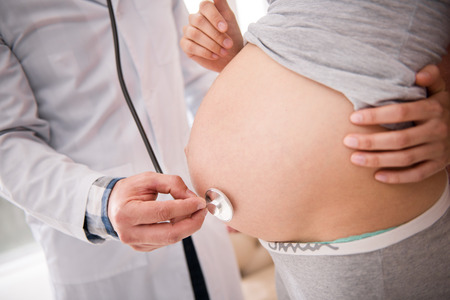 Profile picture of big baby bumpの写真素材