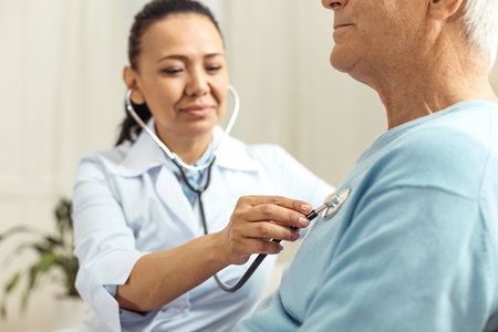 Selective focus of a stethoscope being in useの写真素材