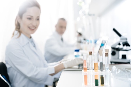 Silhouettes of two colleagues that working at projectの写真素材