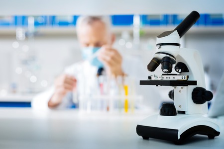Close up of microscope being ready for usageの写真素材