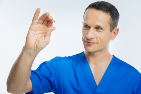 Medical professional examining while pillの写真素材