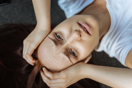 Unhappy gloomy woman looking at youの写真素材