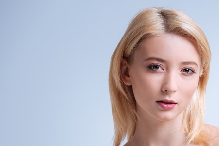 Charming female person looking at cameraの写真素材