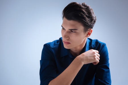 Serious man being deep in thoughts