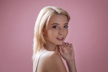 Portrait of delighted blonde that looking forwardの写真素材