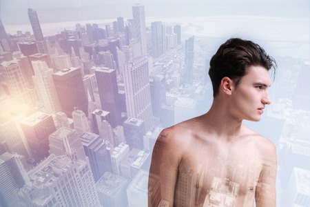 Successful model standing in urban surroundingの写真素材