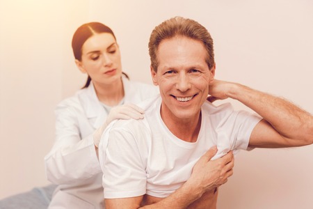 Smiling mature man vising his doctorの写真素材