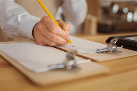 Selective focus of a pencil used for writingの写真素材