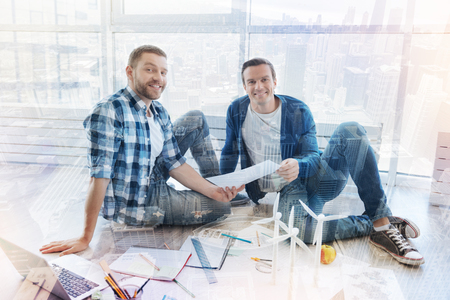 Two best friends working togetherの写真素材