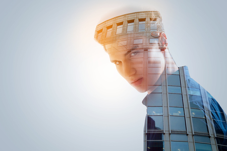 Climbing up. Calm  focused motivated guy knows where he wants to be and he looking straight aheadの写真素材