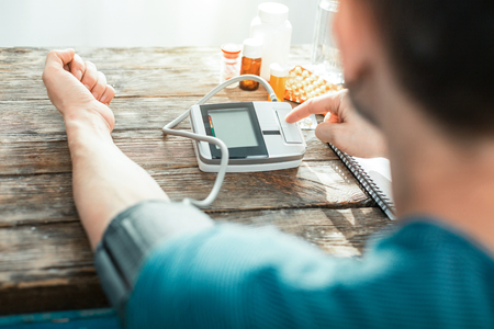 Exact useful tonometer being ready for use by man.の写真素材