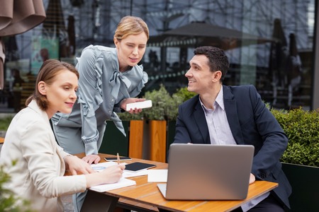 Stylish businesswoman. Successful blonde-haired businesswoman wearing stylish elegant blouse feeling...