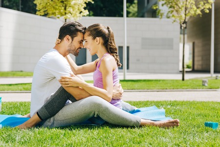 Delighted happy woman smiling while looking at her boyfriendの写真素材