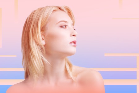 Pretty professional secretary thinking about a career ladder while looking into the distanceの写真素材