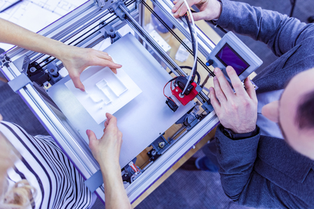 Put it. Competent male person keeping details while waiting for resultの写真素材