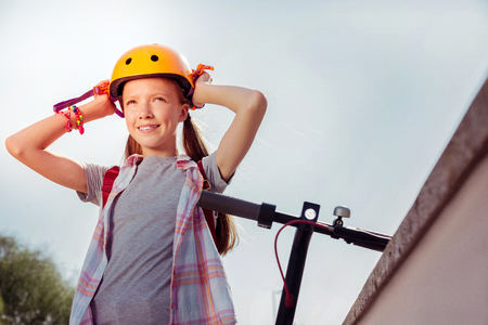 Amazing kid expressing positivity while going to cycling in parkの写真素材