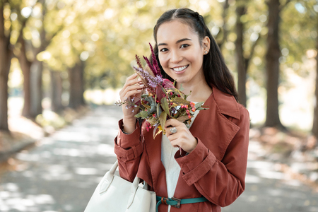 Amazing brunette expressing positivity while having romantic dateの写真素材
