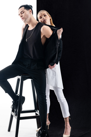Yin or yang. Young models with amazing appearance working in yin and yang photo sessionの写真素材
