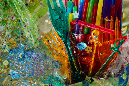 Representing environmental issues. Dangerous plastic disposal straws and forks combined in...