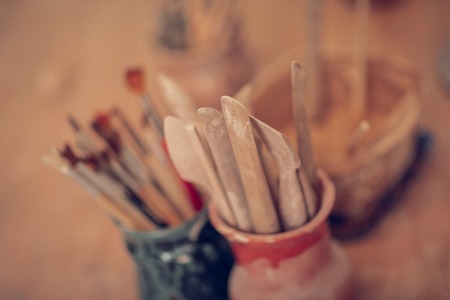 Wooden instruments. Top view of special wooden sticks standing in the cupの写真素材