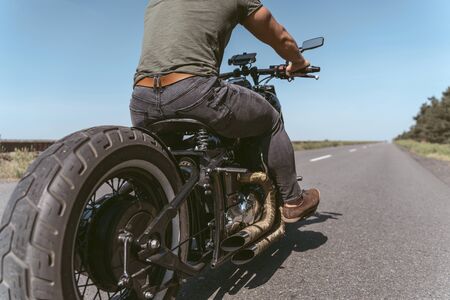 Perspective of a big bike and biker riding it