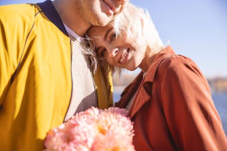 Close up picture of beautiful young couple during their walkの写真素材