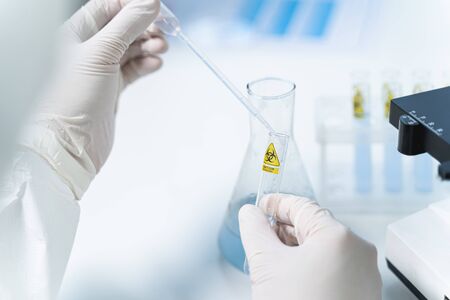 Need a result. Competent scientist being at his workplace, testing reaction on new vaccine