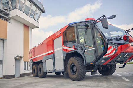 Low angle photo of modern fire truck standing in the fire station