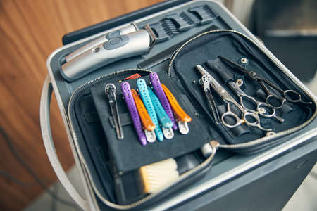 Sterile scissors lying on the workplace while being ready for use