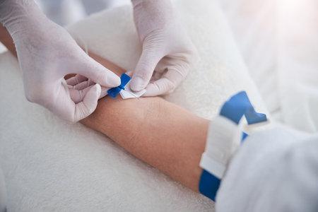 Close up portrait of nurse hands in gloves getting treatment vitamin drip for patient in beauty...