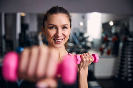 Portrait of happy woman that doing sportの写真素材