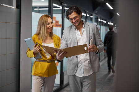 Cheerful male person having fun during workの写真素材