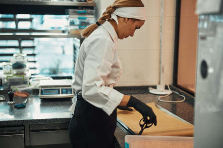 Experienced cook getting ready to bake something tasty
