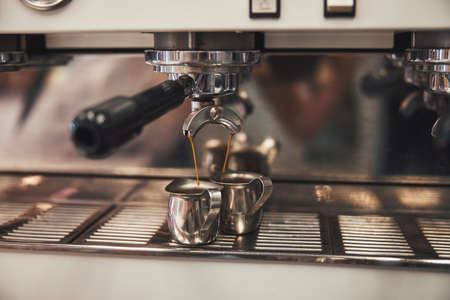 Magical process of cooking two espressos at the same timeの写真素材