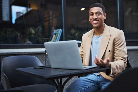 Portrait of handsome man being in cafe