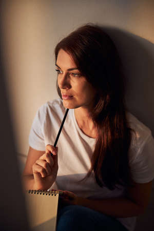 Portrait of cute woman that thinking about her business