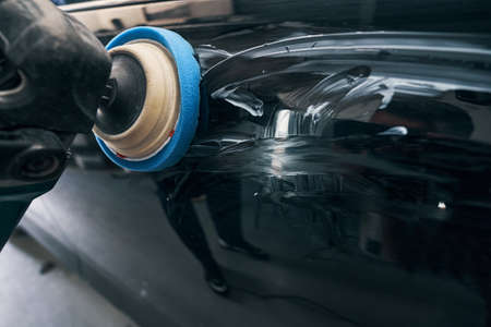 Polishing instrument with soft pad pressed to car surface