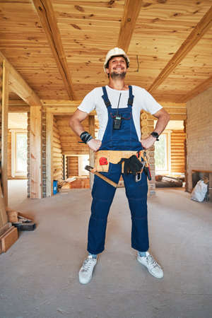 Housebuilder posing to camera with proud expression
