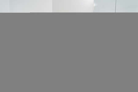 Relaxed mature client enjoying salon beauty procedureの写真素材