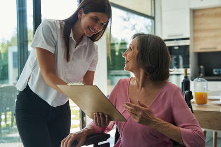Young lady and female talking about condition and health