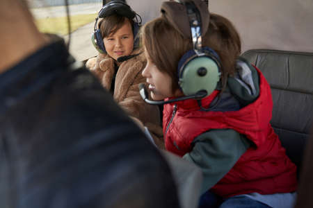 Adventurous kids going on a private aerial tripの写真素材
