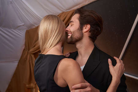 Laughing male dancing with his significant other
