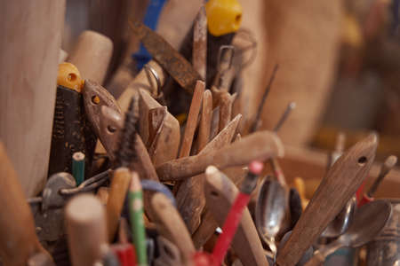 Miscellaneous clay tools and stationery in potter studio