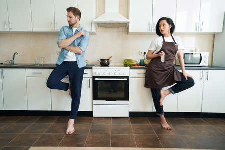 Offended man ignoring his female companion after argumentの写真素材