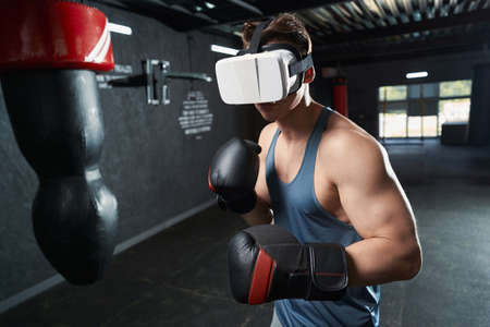 Adult male athlete training in virtual realityの写真素材