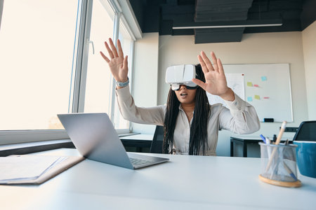 Office worker using new technology in workplace