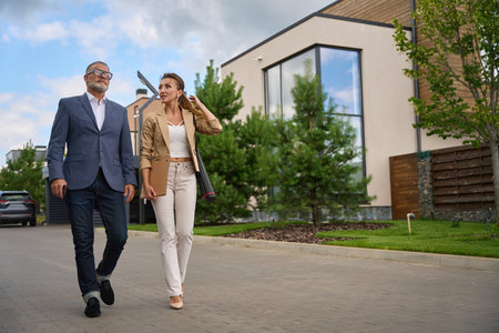 Female real estate agent met with a client for a home showingの写真素材