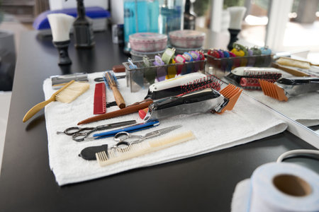 Selection of must-have hairdresser equipment and tools on tabletopの写真素材